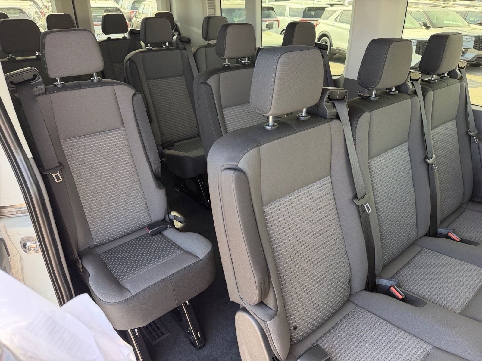 New 2026 Oxford White Ford Passenger Van XLT image 13
