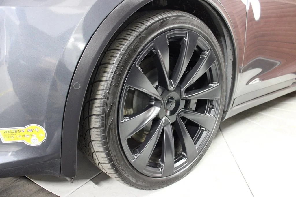 Used 2022 Solid Black Tesla Plaid image 3