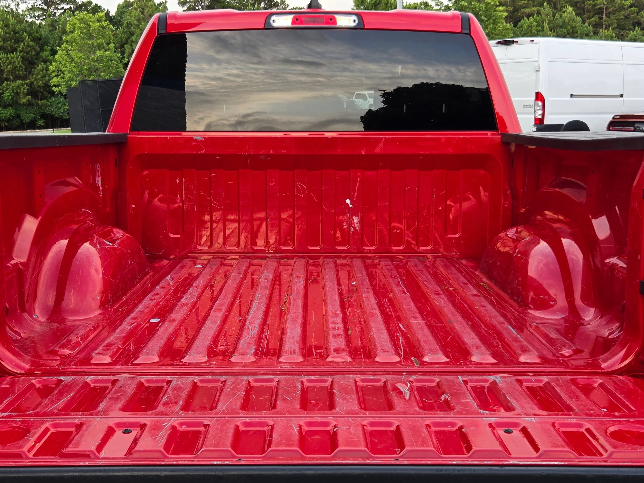 Used 2024 Flame Red Clearcoat RAM Laramie image 18