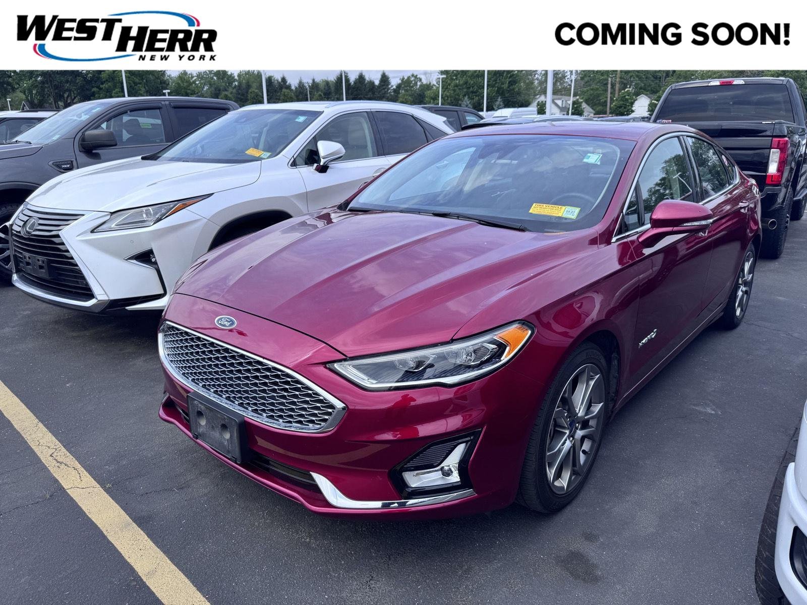 Used 2019 Ruby Red Metallic Tinted Clearcoat Ford Titanium image 1