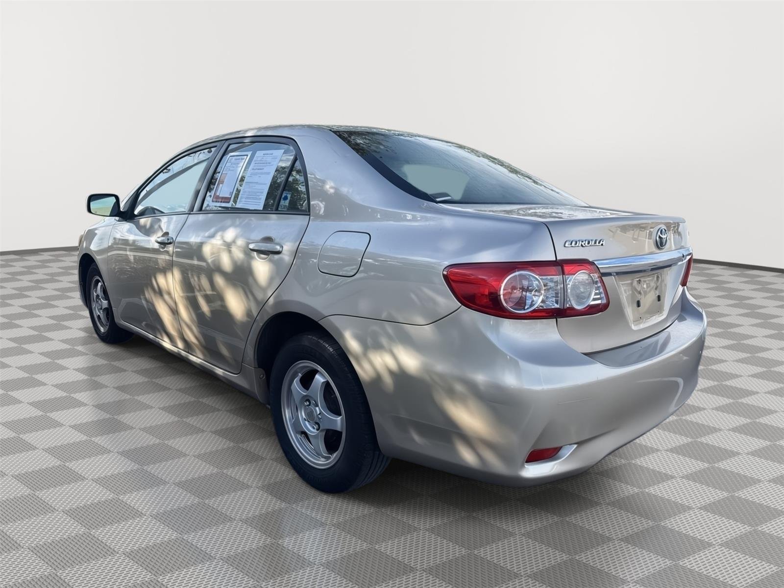Used 2011 Sandy Beach Metallic Toyota LE image 10