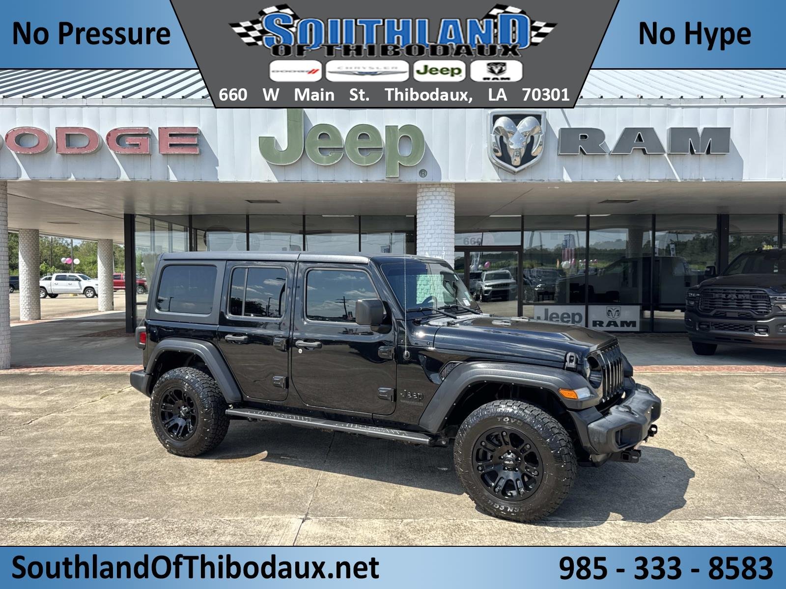 Used 2022 Black Jeep Unlimited Sport image 1