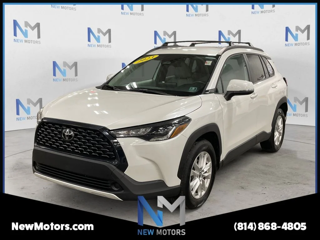 Used 2023 Pearl Toyota LE image 1