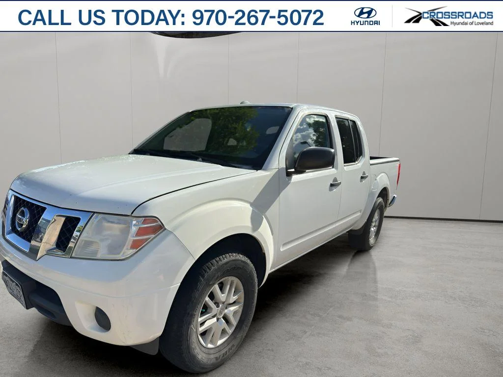 Used 2016 Glacier White Nissan SV image 1