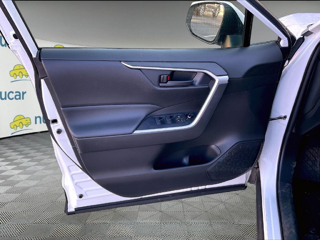Used 2021 Super White Toyota LE image 9