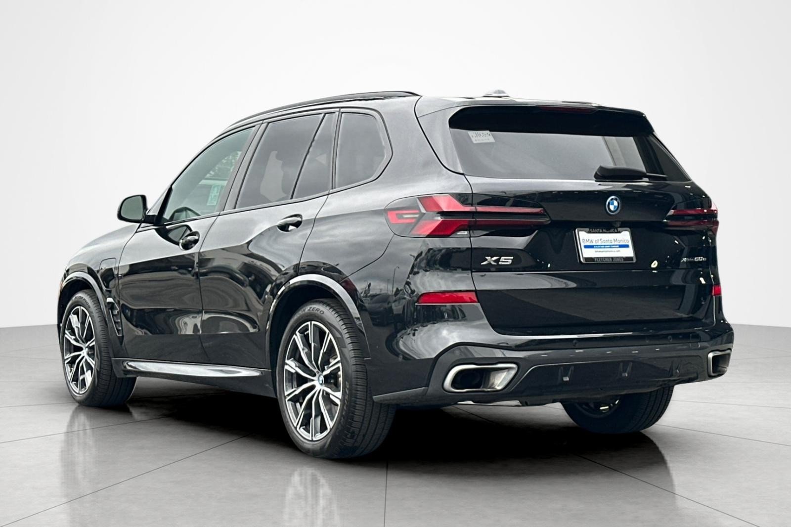 Used 2024 Black Sapphire Metallic BMW xDrive50e image 3