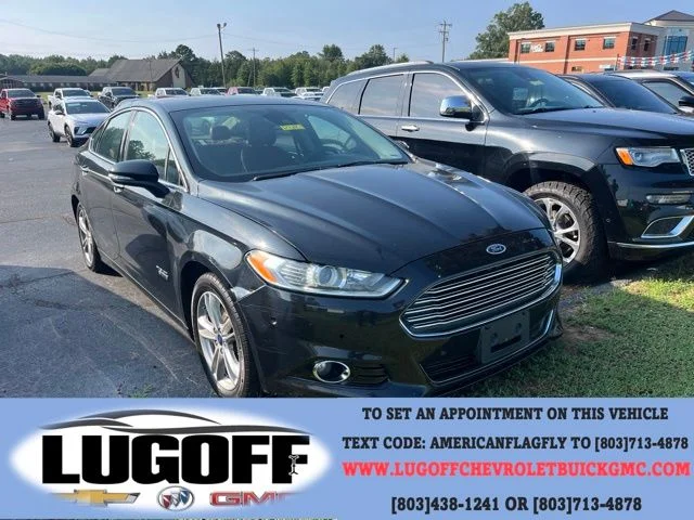 Used 2015 Black Ford Titanium image 1