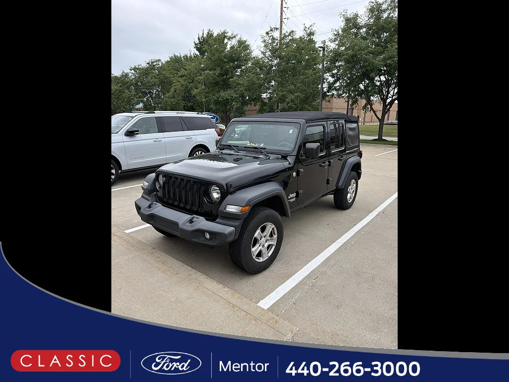 Used 2018 Black Clearcoat Jeep Sport image 1