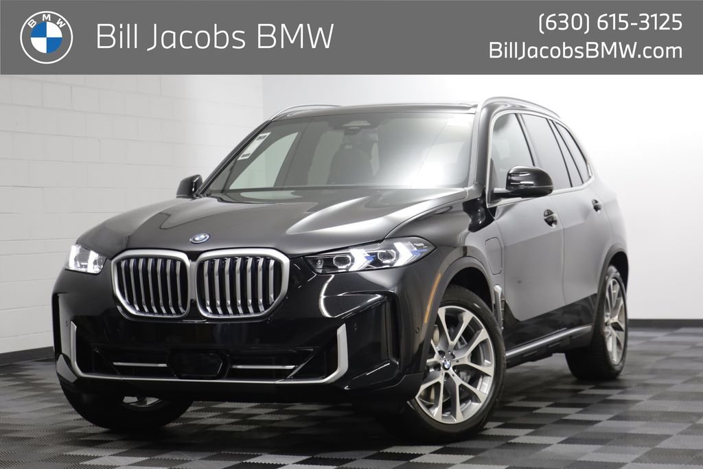 New 2026 Black Sapphire Metallic BMW xDrive50e image 1