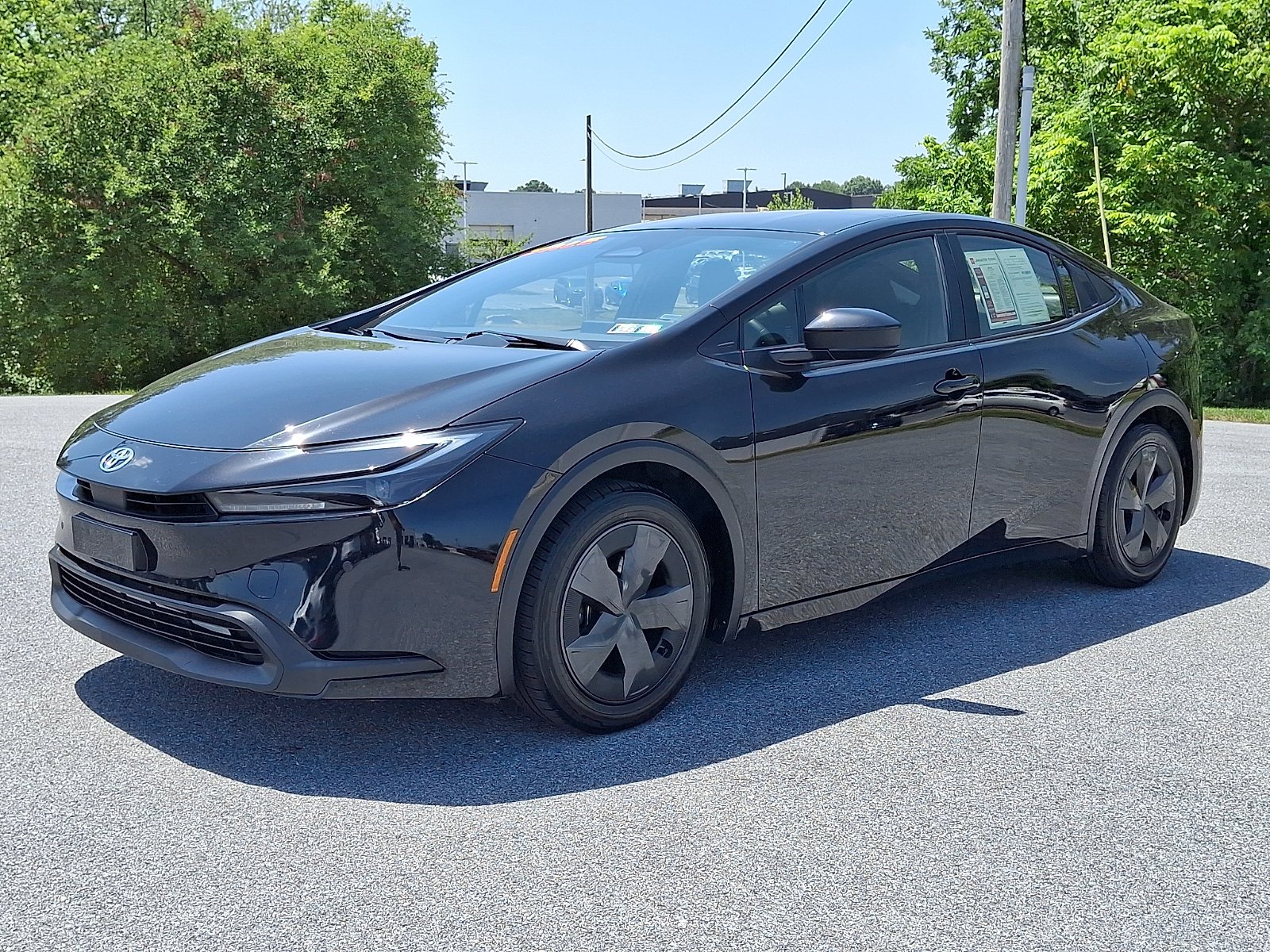 Used 2025 Midnight Black Metallic Toyota LE image 3