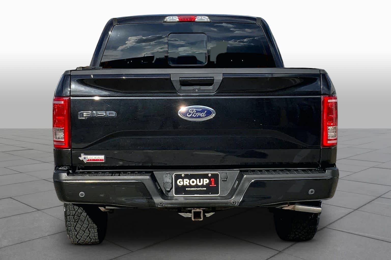 Used 2015 Tuxedo Black Metallic Ford XLT image 4