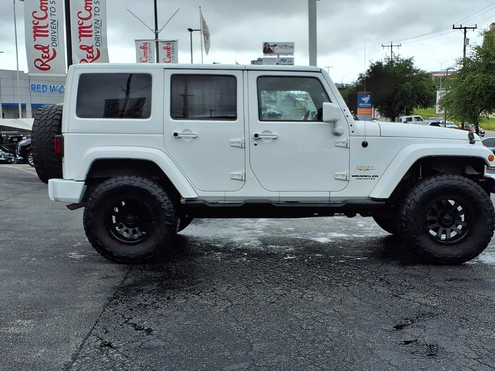 Used 2013 Bright White Jeep Sahara image 4