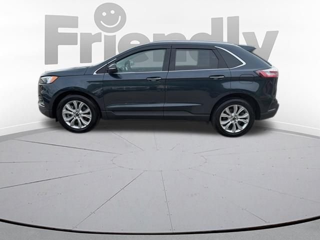 Used 2023 Blue Ford Titanium image 4