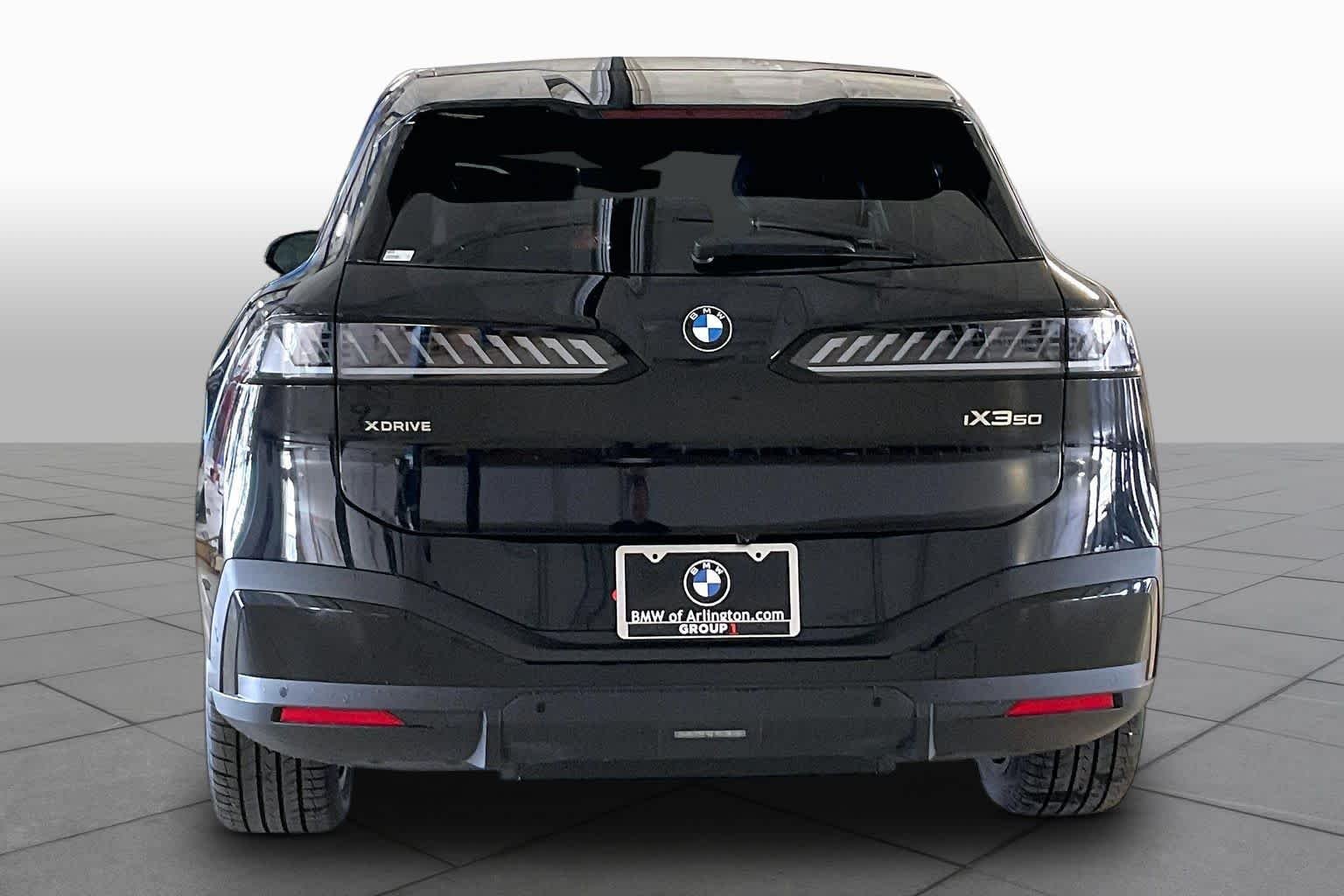 New 2027 Black Sapphire Metallic BMW 50 xDrive image 4