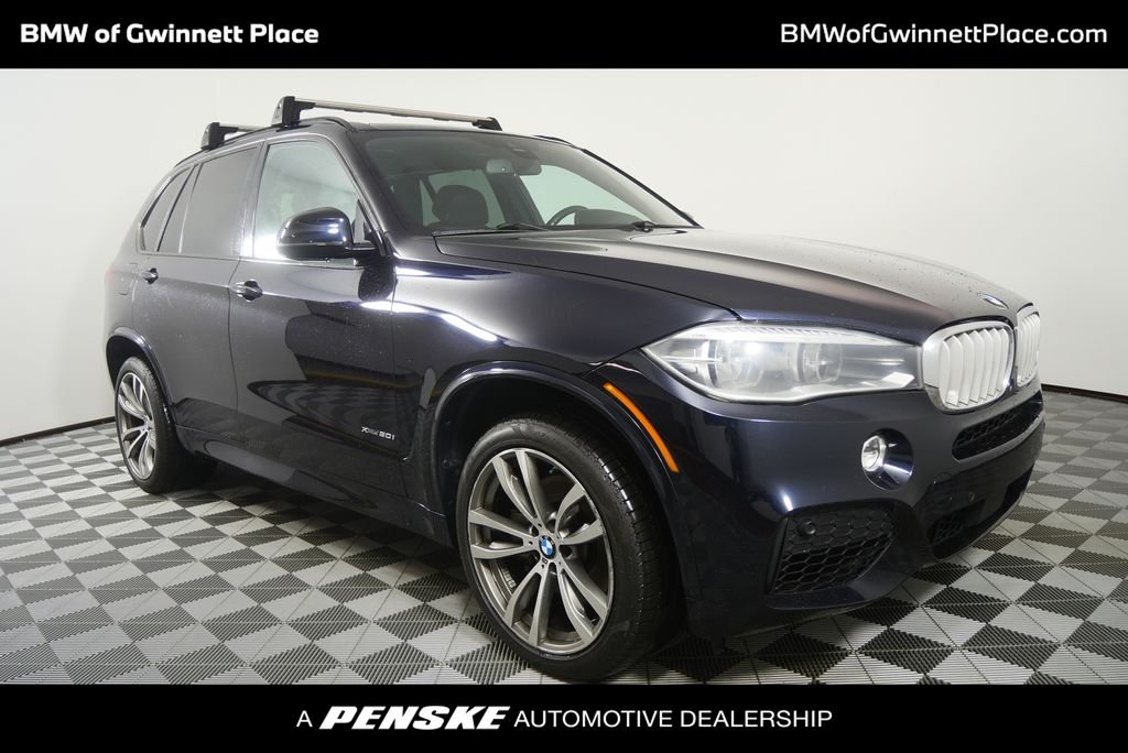 Used 2014 Carbon Black Metallic BMW xDrive50i image 1
