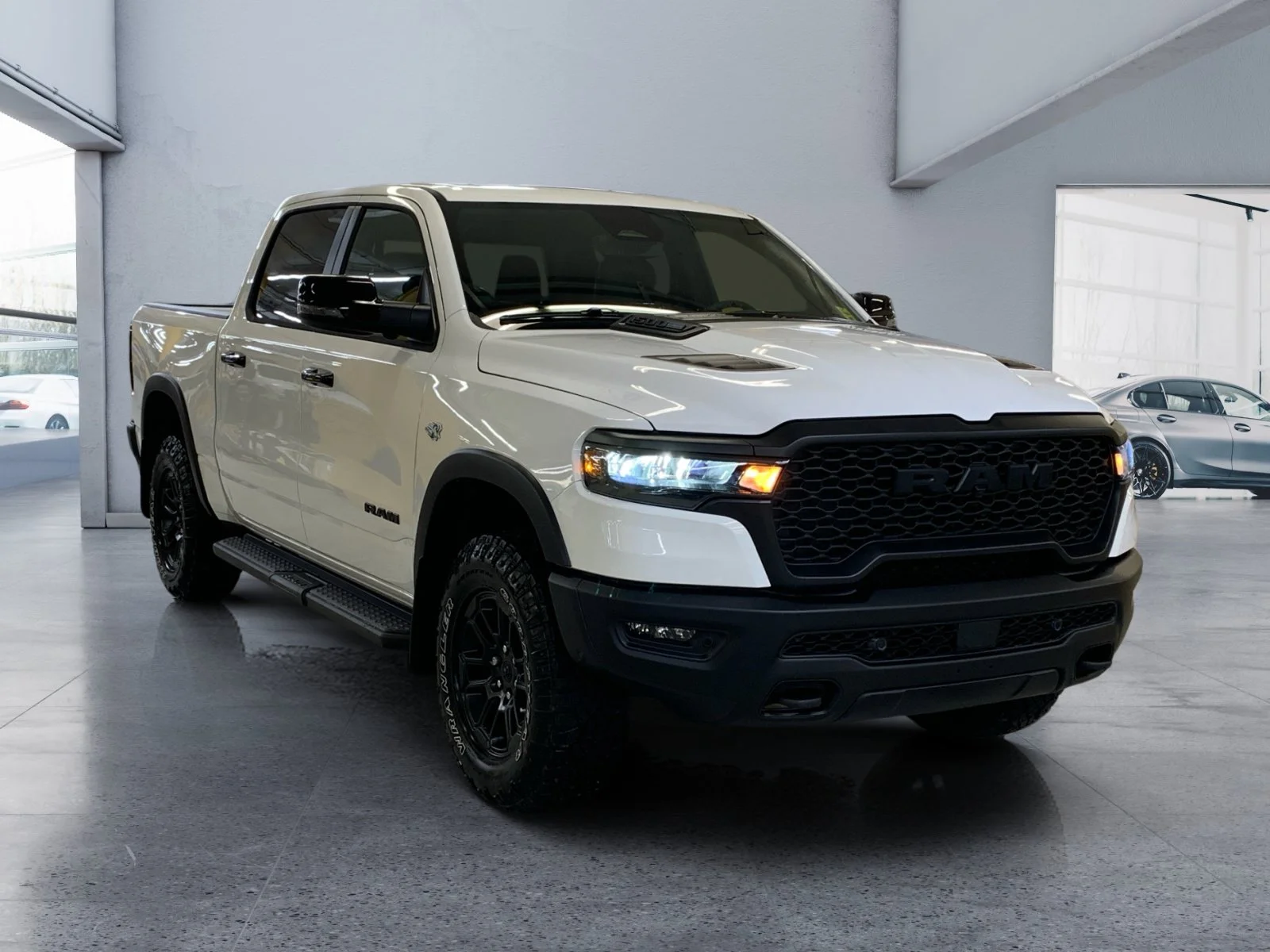 New 2026 Bright White Ram Rebel image 7