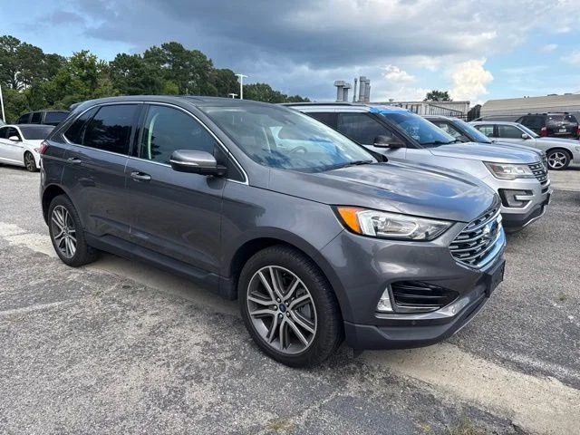 Used 2022 Gray Metallic Ford Titanium image 1