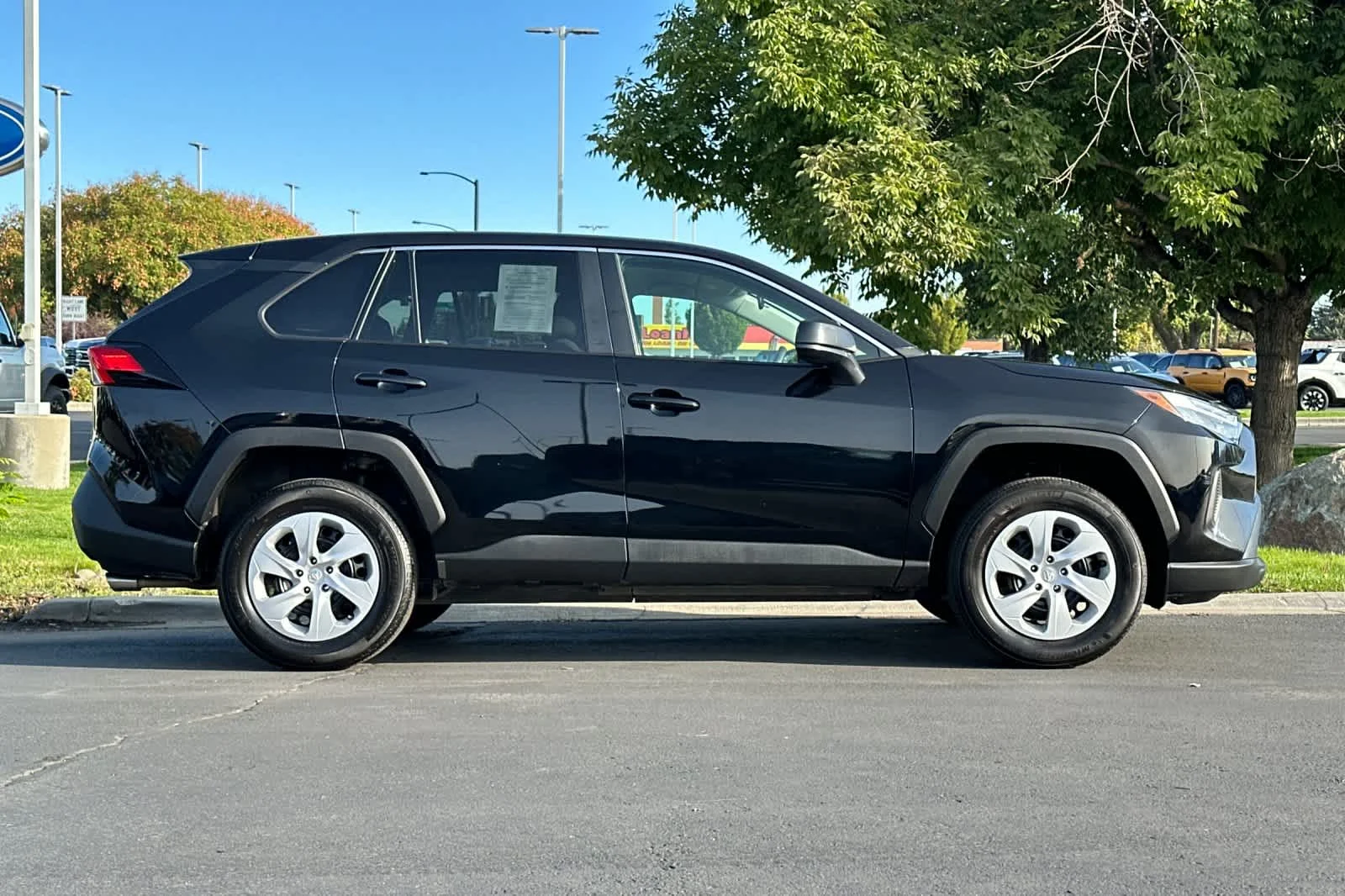 Certified Used 2025 Midnight Black Metallic Toyota LE image 8
