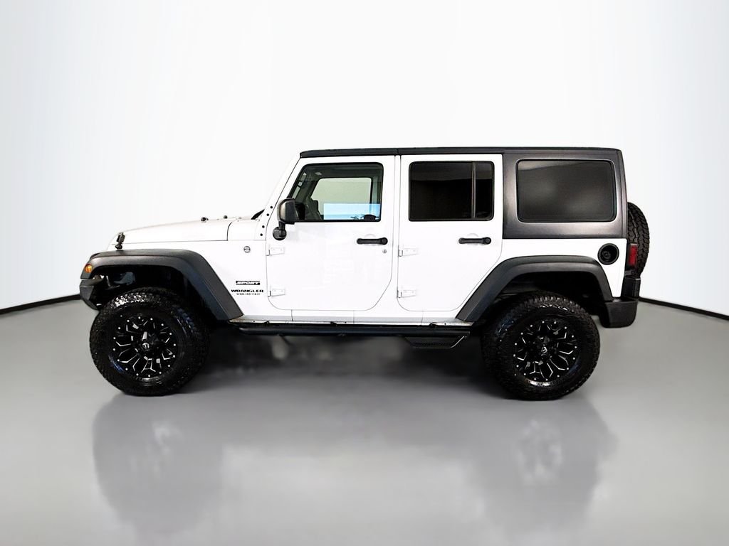 Used 2015 White Jeep Unlimited Sport image 2