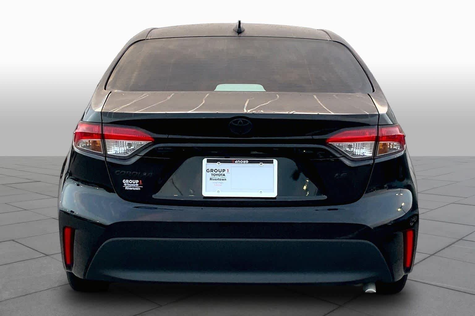 Used 2024 Midnight Black Metallic Toyota LE image 5
