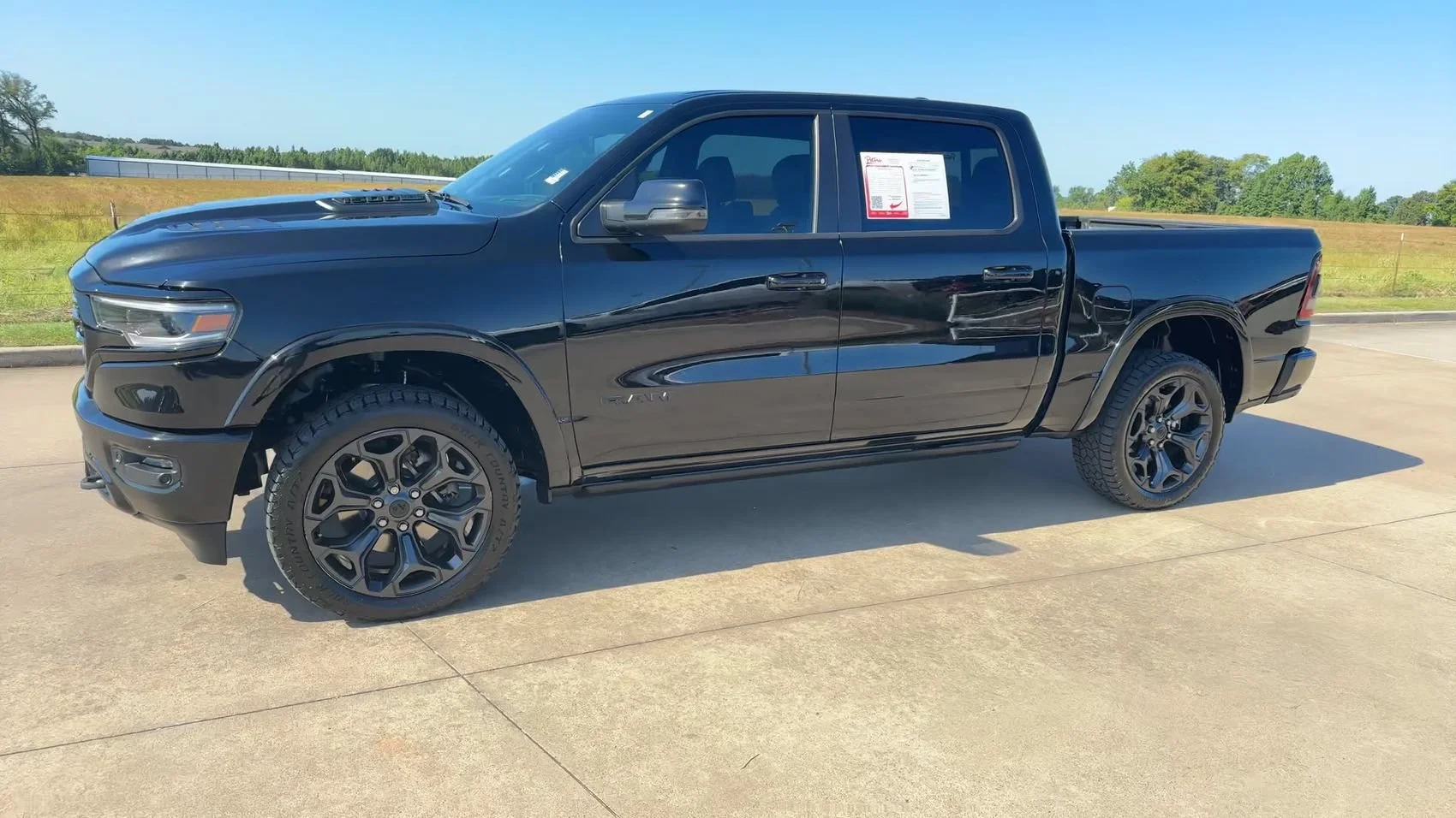Used 2023 Diamond Black Crystal Pearlcoat Ram Limited image 5