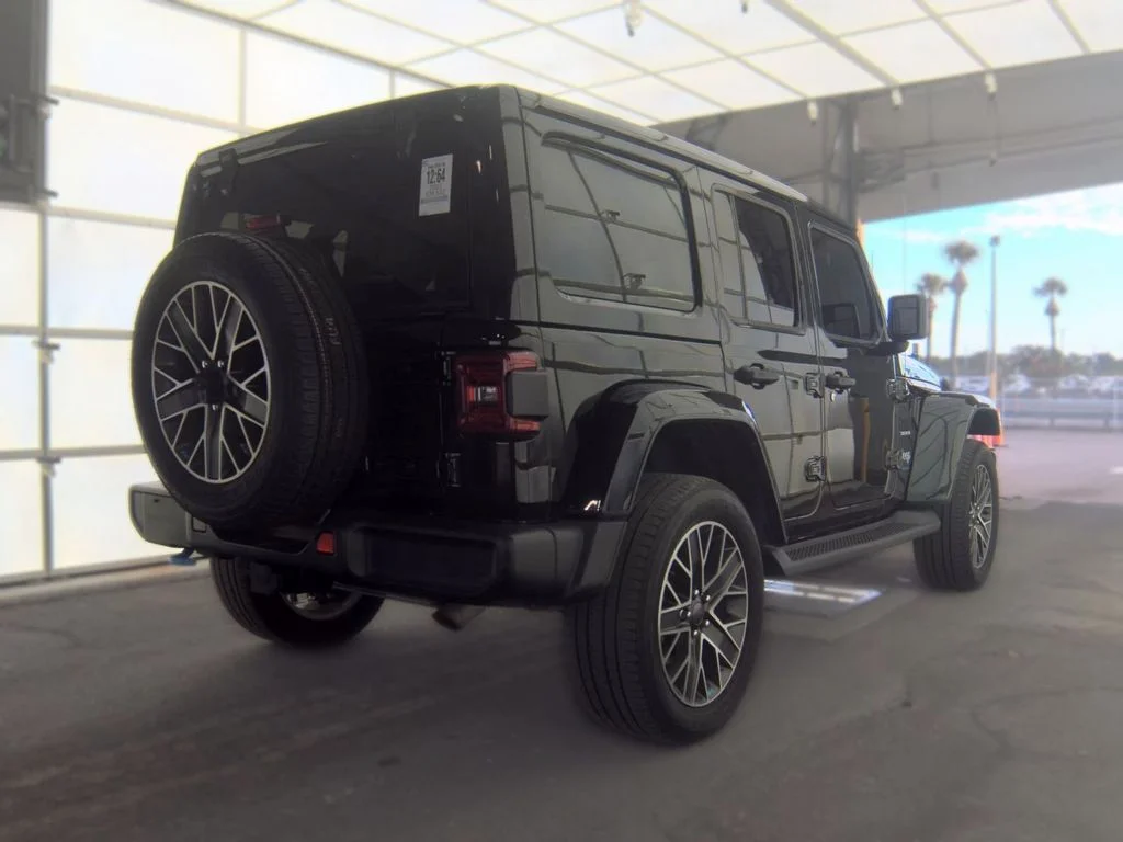 Used 2023 Black Jeep Sahara 4xe image 2