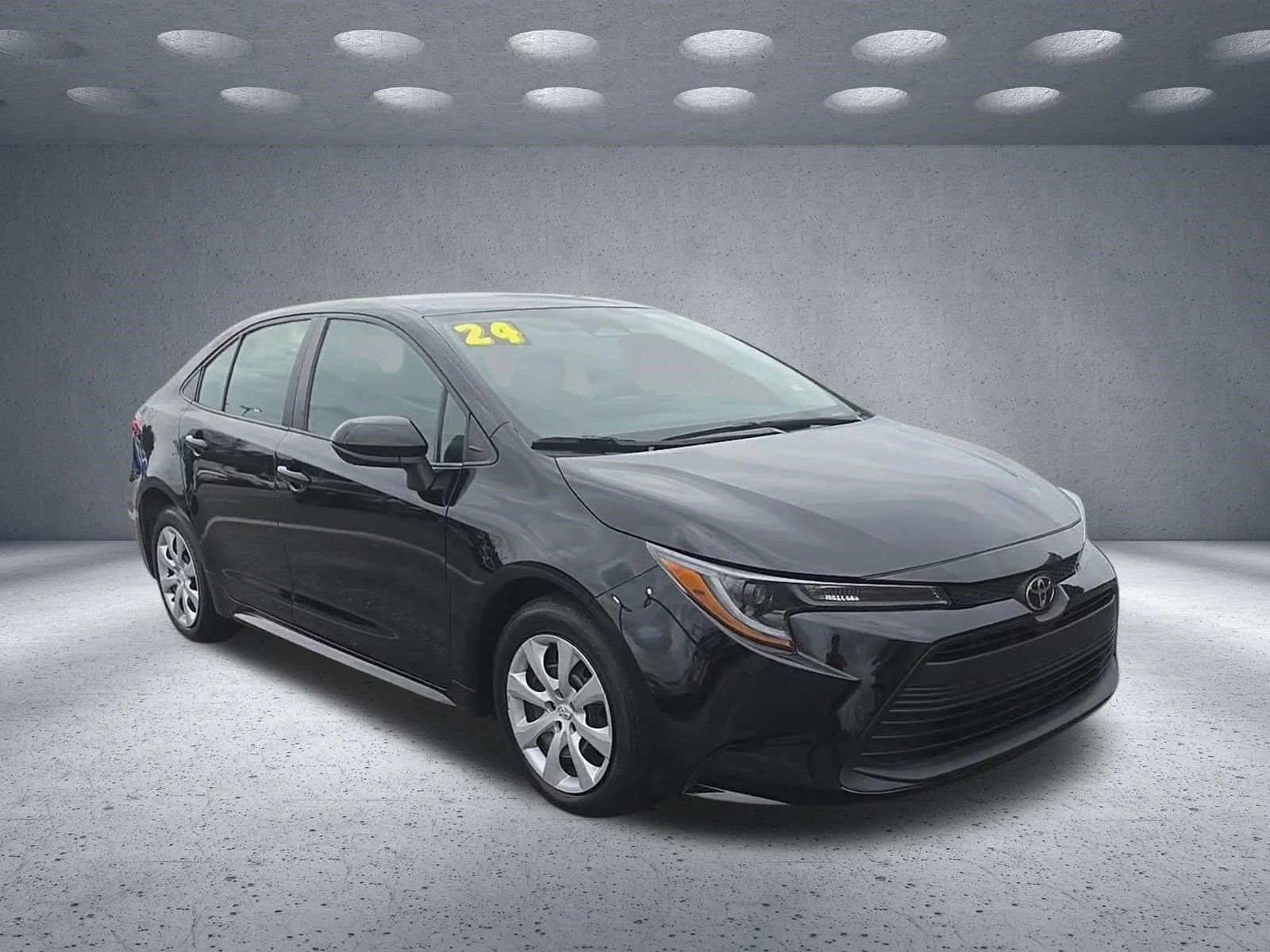Used 2024 Black Toyota LE image 1