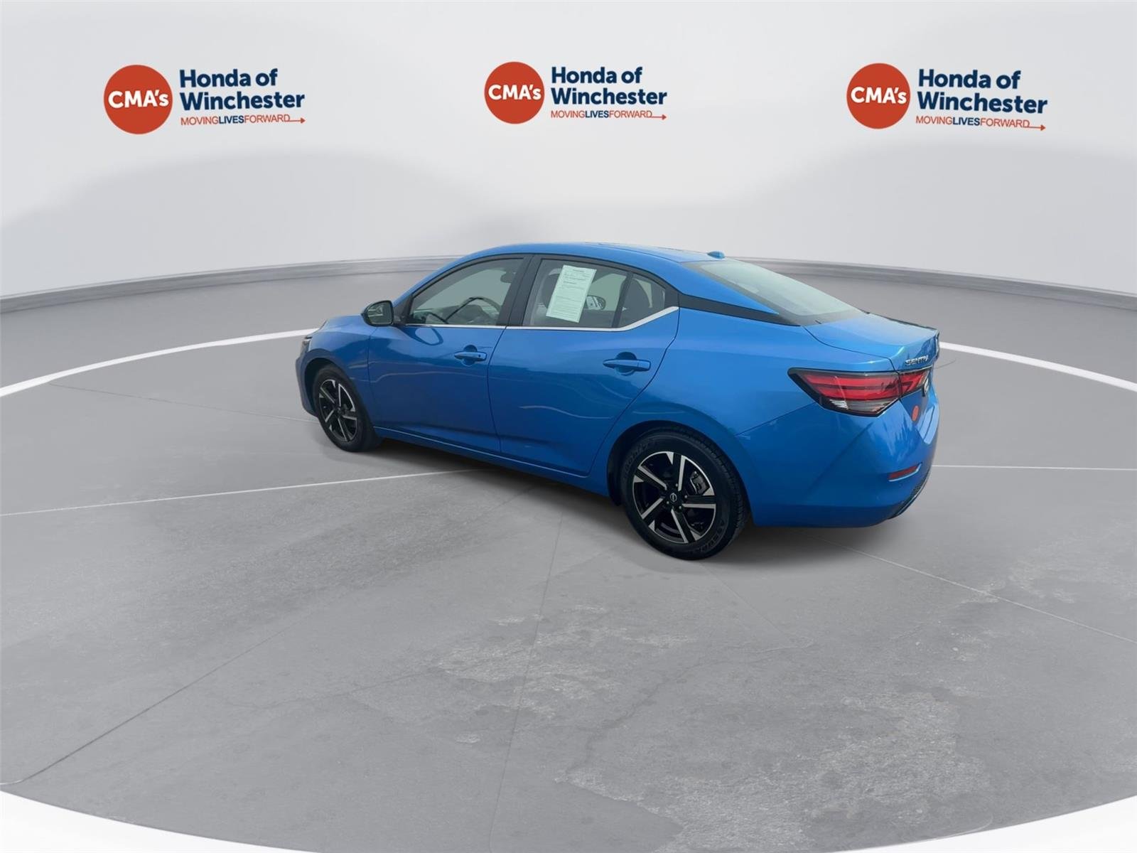 Used 2025 Electric Blue Metallic Nissan SV image 6