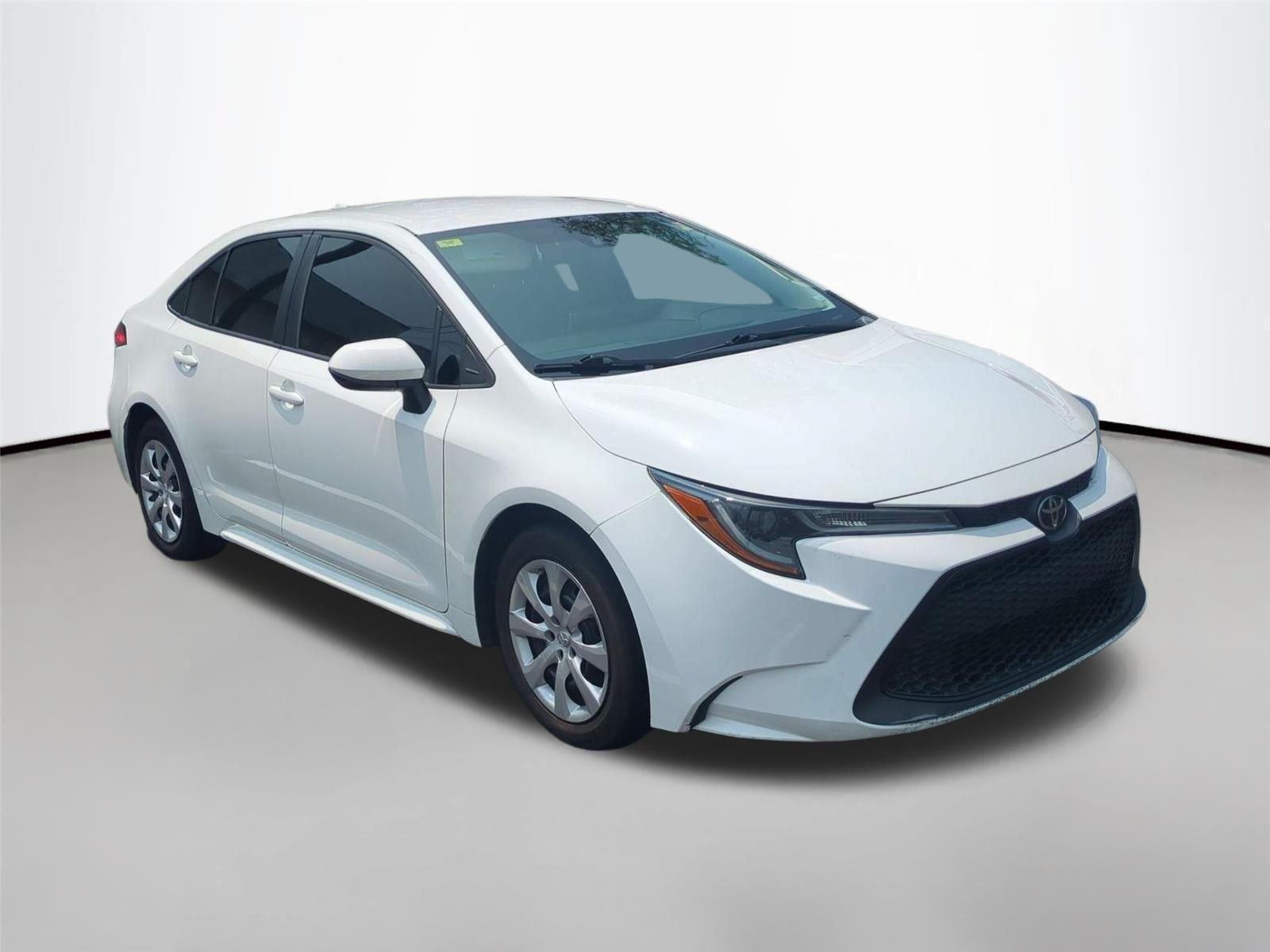 Used 2021 Super White Toyota LE image 2