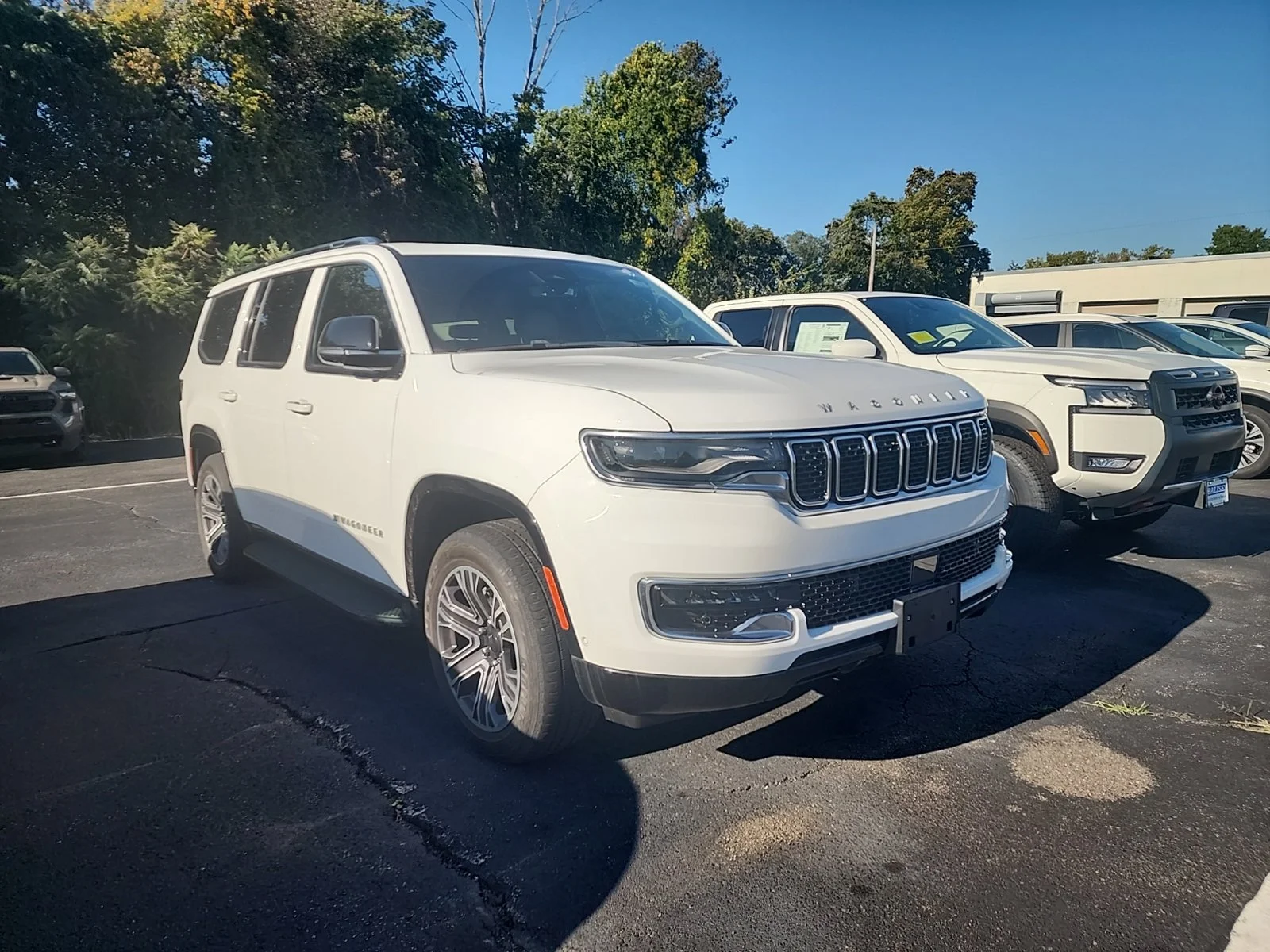Used 2023 Bright White Clearcoat Jeep Base image 1
