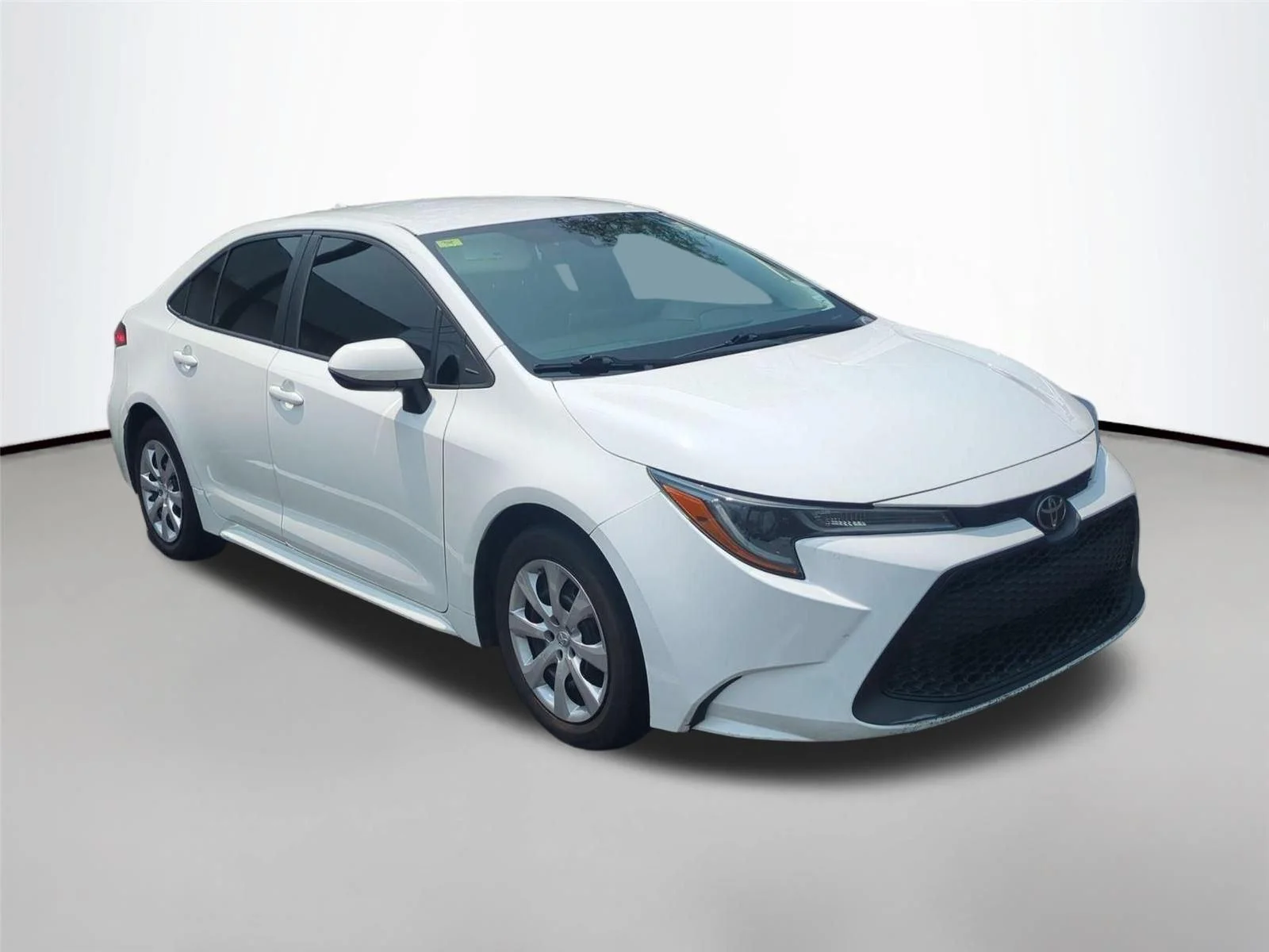 Used 2021 Super White Toyota LE image 3