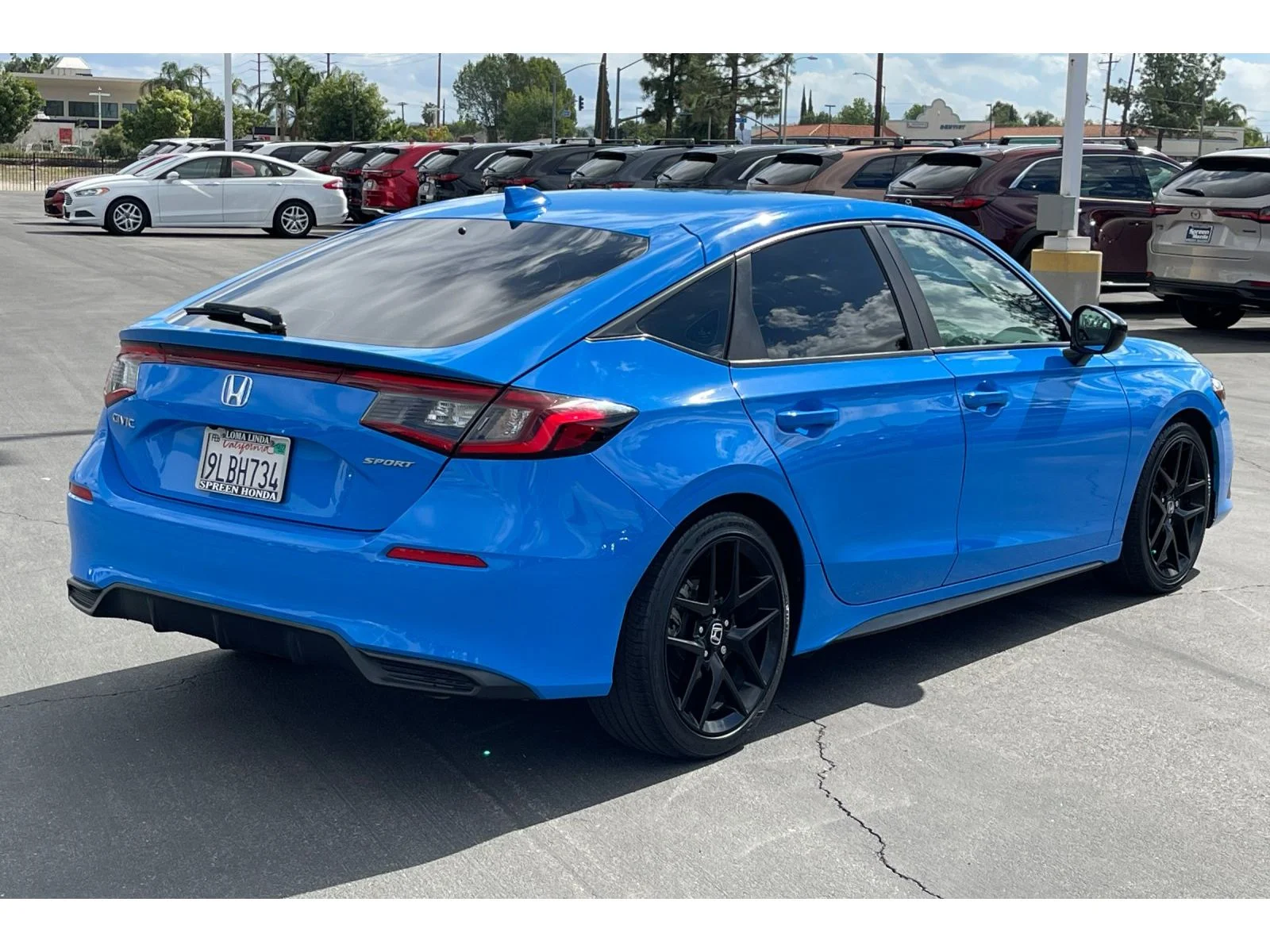 Used 2024 Boost Blue Pearl Honda Sport image 6