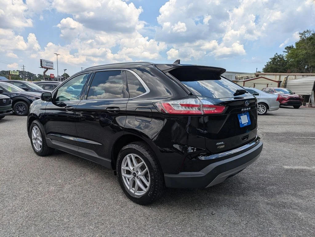 Certified Used 2024 Agate Black Metallic Ford SEL image 6