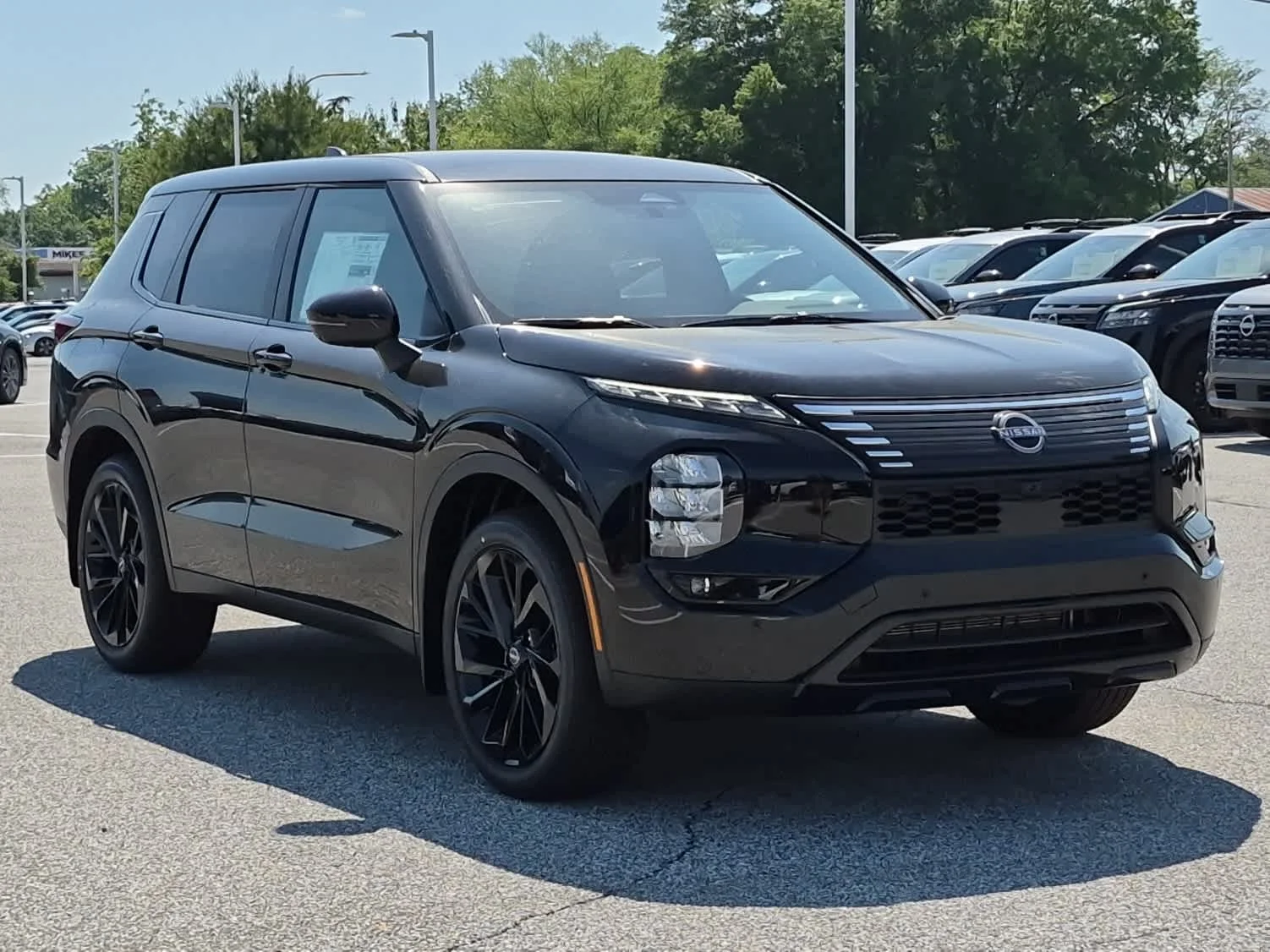 New 2026 Cosmic Black Nissan SL image 2
