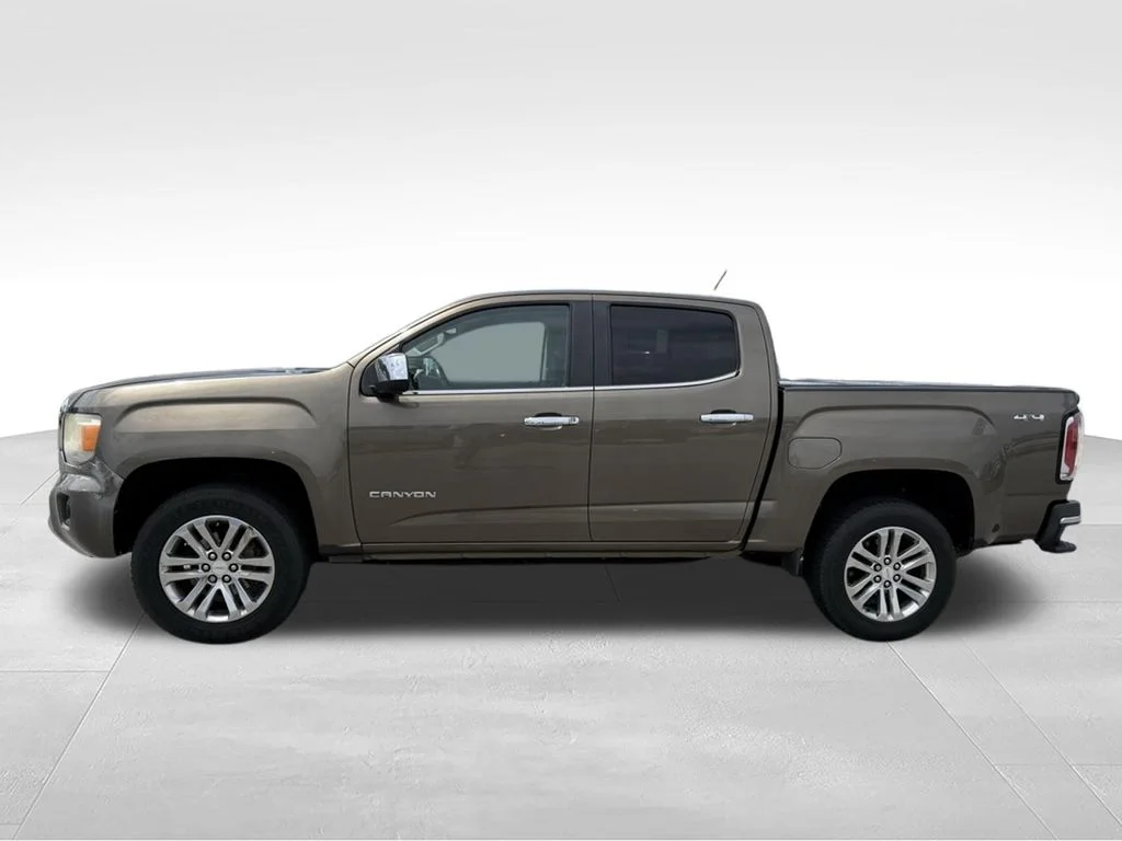 Used 2015 GMC Canyon SLT with VIN 1GTG6CE34F1270854 for sale in Pell City, AL