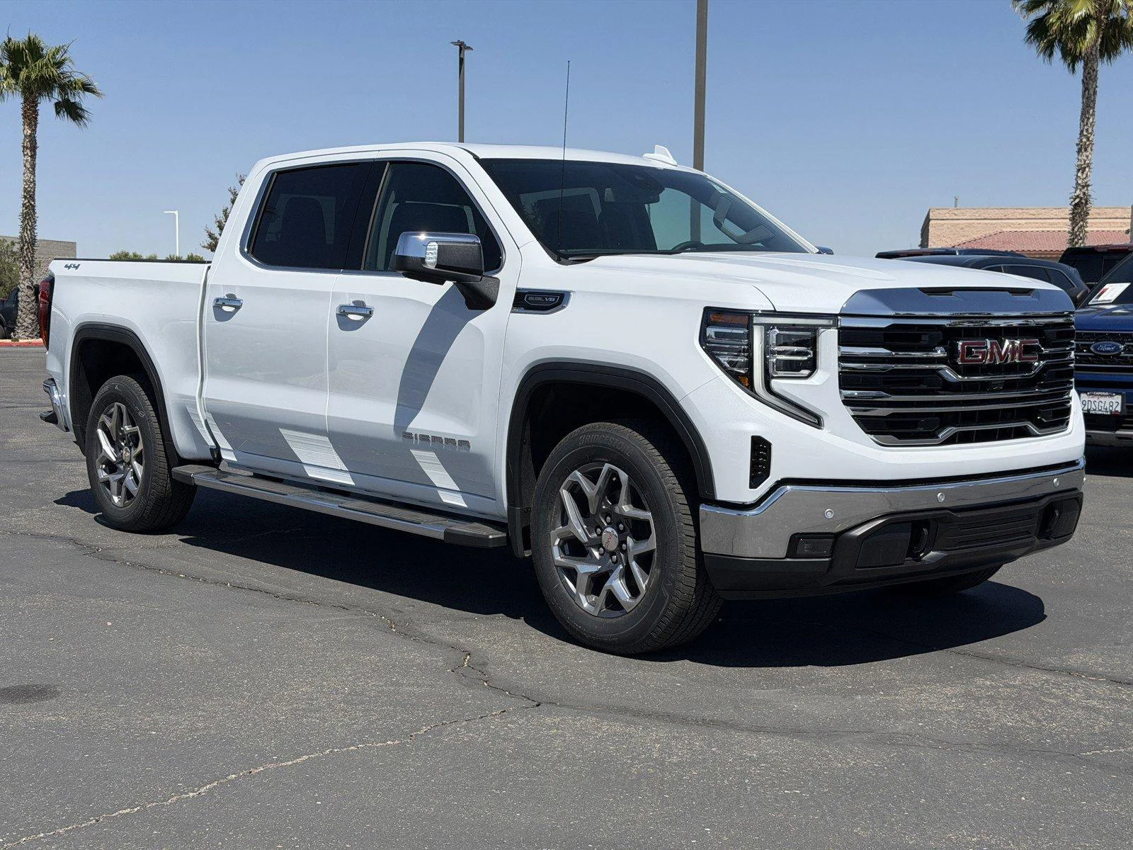 New 2026 Glacier White Tricoat GMC SLT image 1