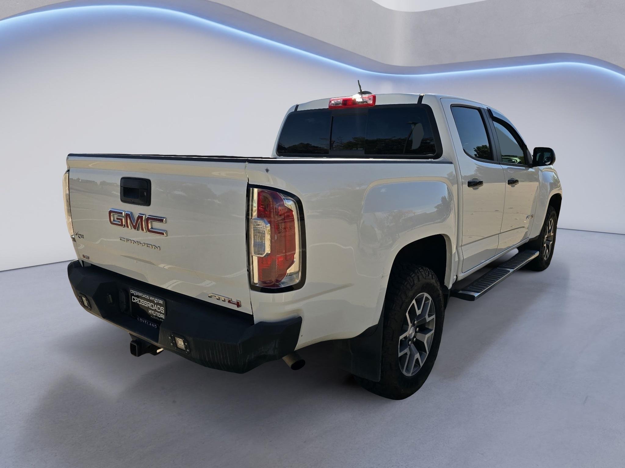 Used 2021 Summit White GMC 4WD AT4 w/Cloth image 6