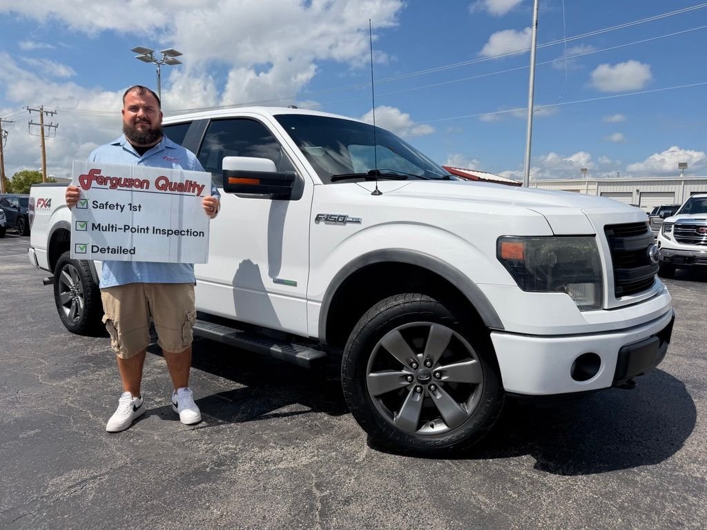 White 2014 Ford F-150 Pickup Truck Four-Wheel Drive