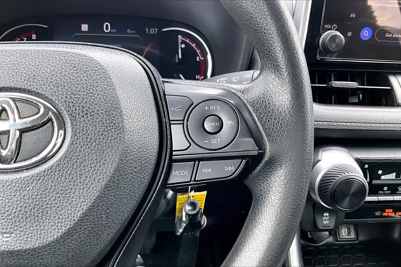 Used 2023 Magnetic Gray Metallic Toyota LE image 24