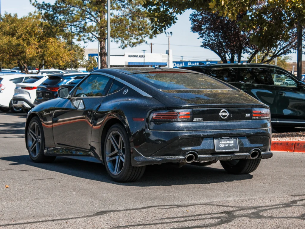 Used 2024 Black Diamond Pearl Nissan Sport image 7