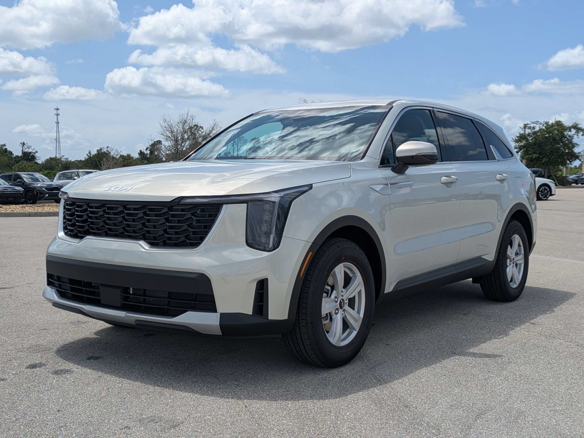 New 2026 Ivory Silver Kia LX image 9