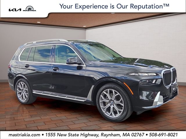 Used 2026 Black Sapphire Metallic BMW xDrive40i image 1