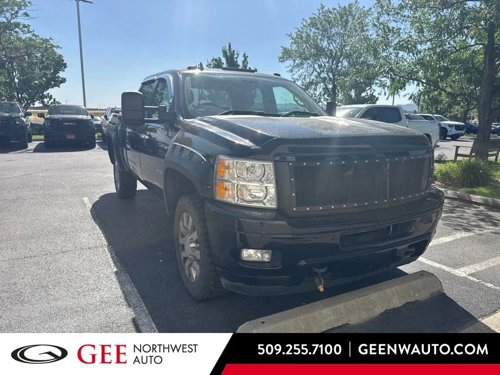 Used 2013 Black Chevrolet LTZ image 1