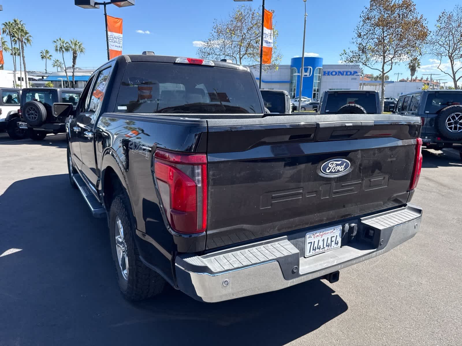 Used 2025 Agate Black Metallic Ford XLT image 14