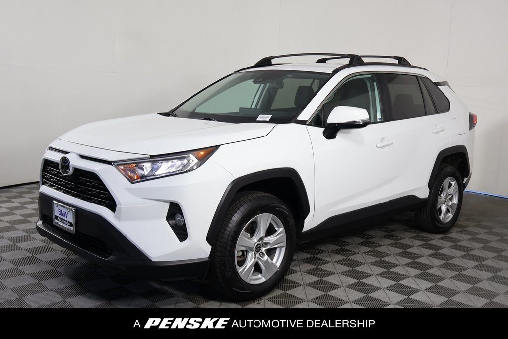 Used 2021 Super White Toyota XLE image 1
