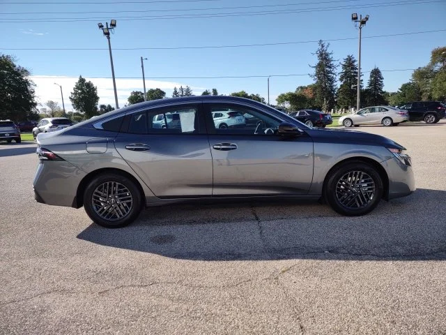 Used 2027 Gun Metallic Nissan SV image 7