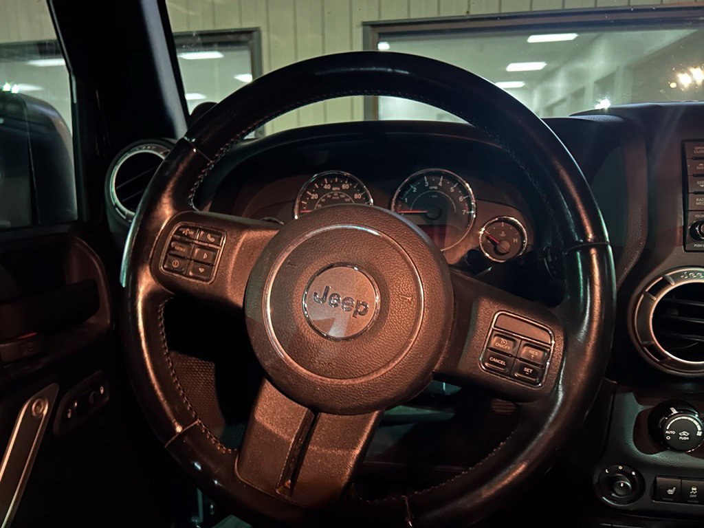 Used 2012 Black Jeep Unlimited Sahara image 6