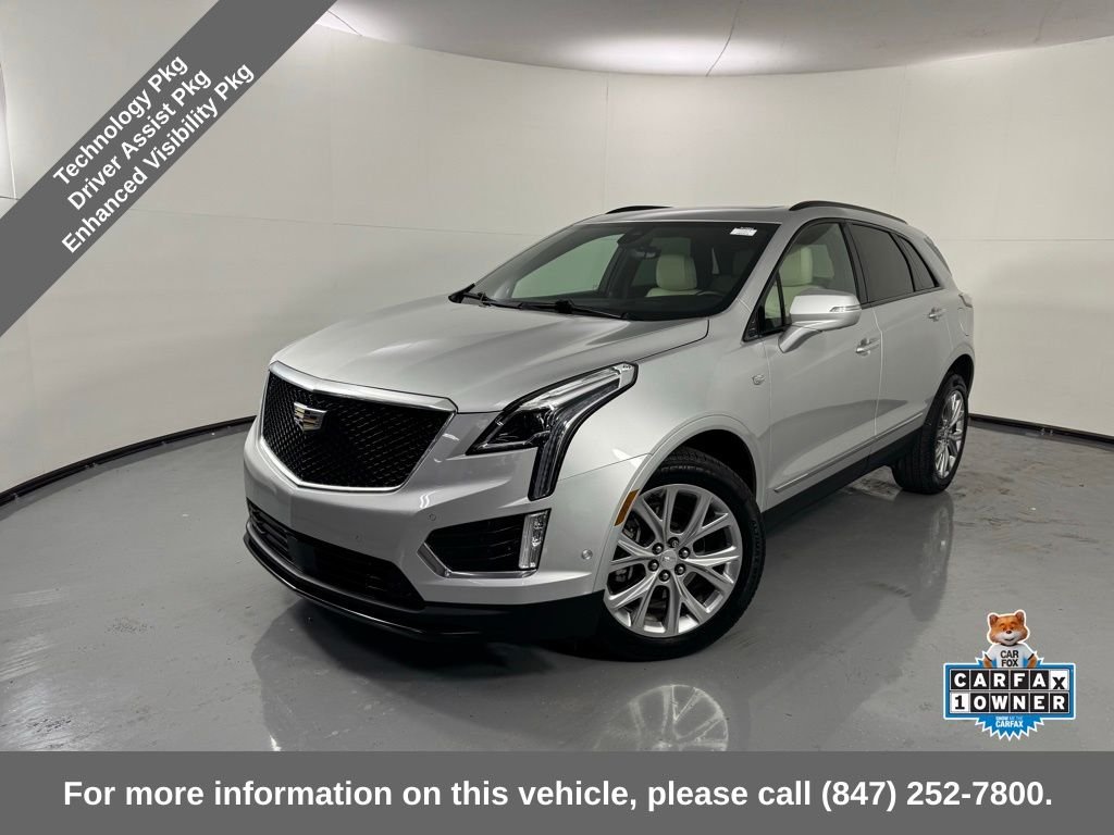 Used 2020 Radiant Silver Metallic Cadillac Sport image 1