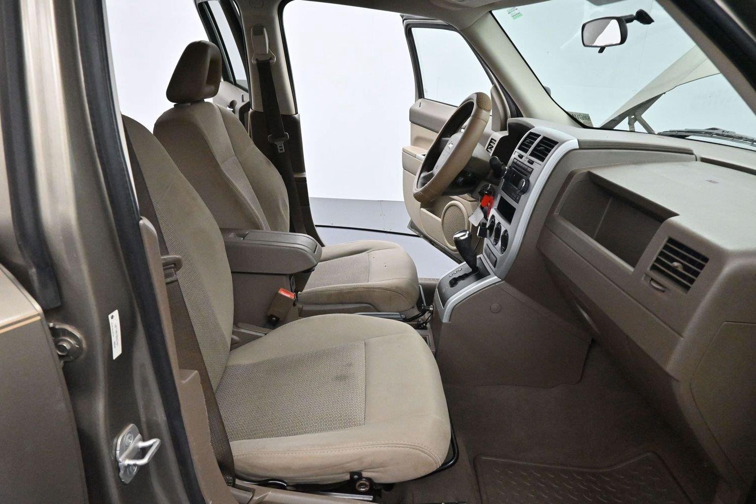 Used 2008 Light Khaki Metallic Jeep Sport image 23