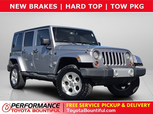 Pre-Owned 2013 Jeep Wrangler Unlimited Sahara Sport Utility in
